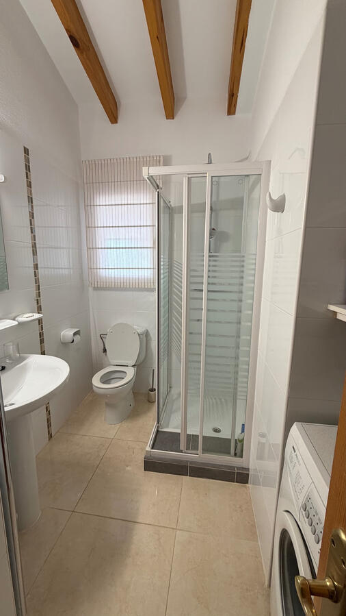 Gästebad mit Waschmaschine